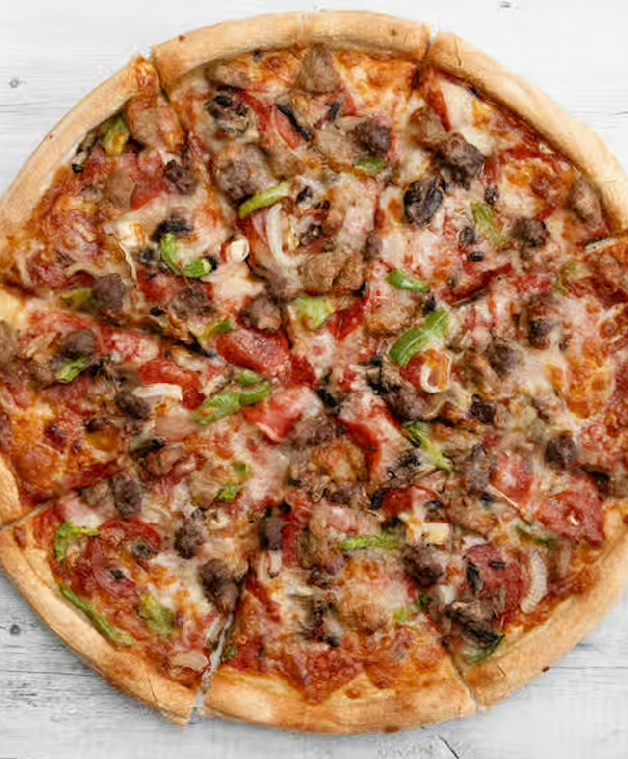 Mushroom, onion, green pepper, pepperoni, hamburger, sausage - red sauce base pizza