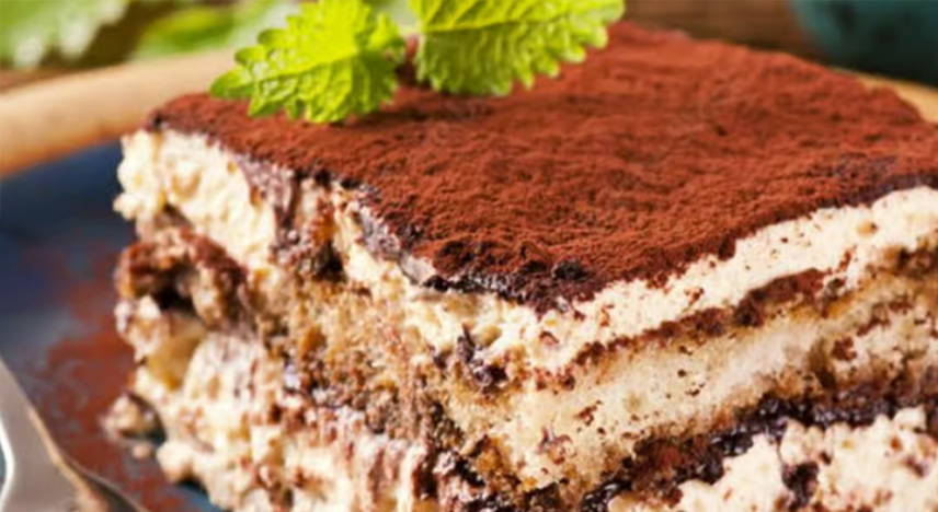 Classic Italian dessert made with ladyfingers soaked in coffee, layered with mascarpone cheese and dusted with cocoa.