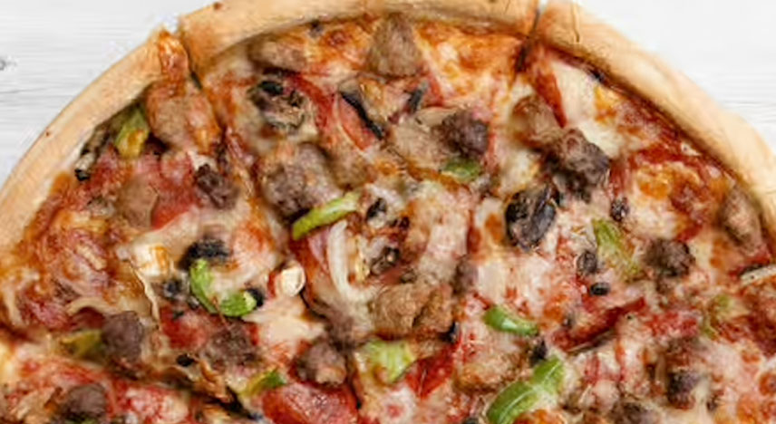 Pizza with sausage, green peppers, black olives and mushrooms.